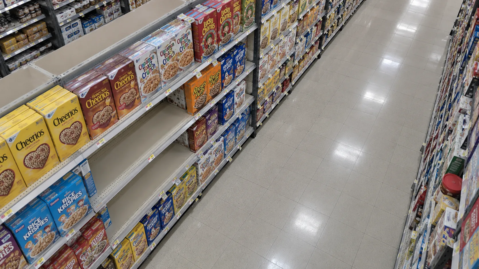 Simulated hanging ceiling CCTV view looking down a cereal aisle at an empty shelf bay